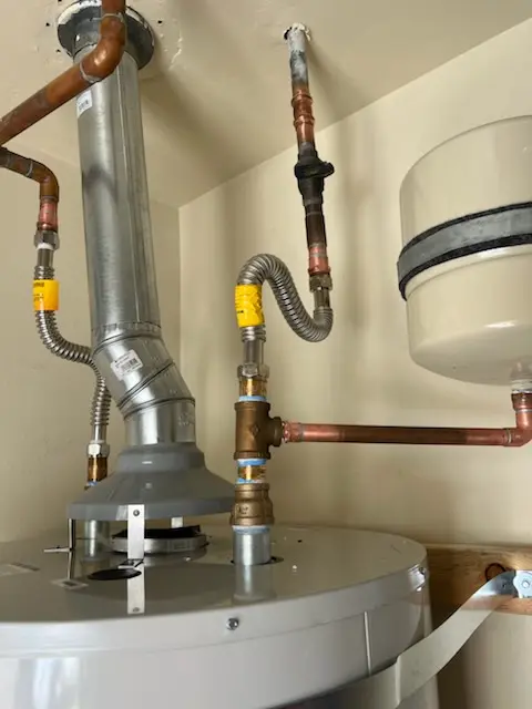 Water heater installation and plumbing repair in Spruce